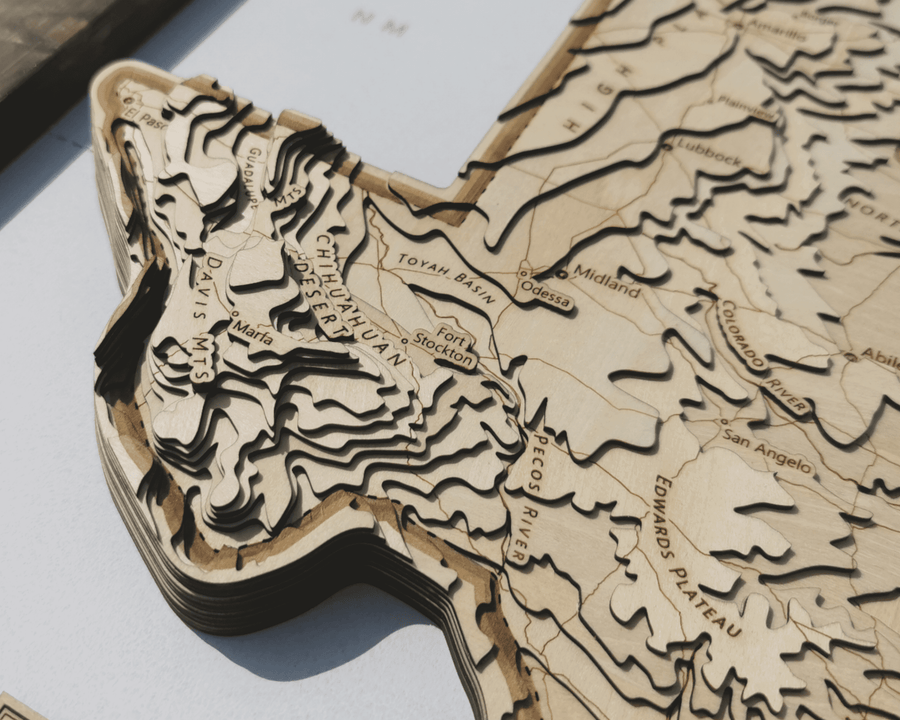 Western texas showing the chihuahuan desert, davis mountians, fort stockton and toyah basin as a wooden topographic carved contour map