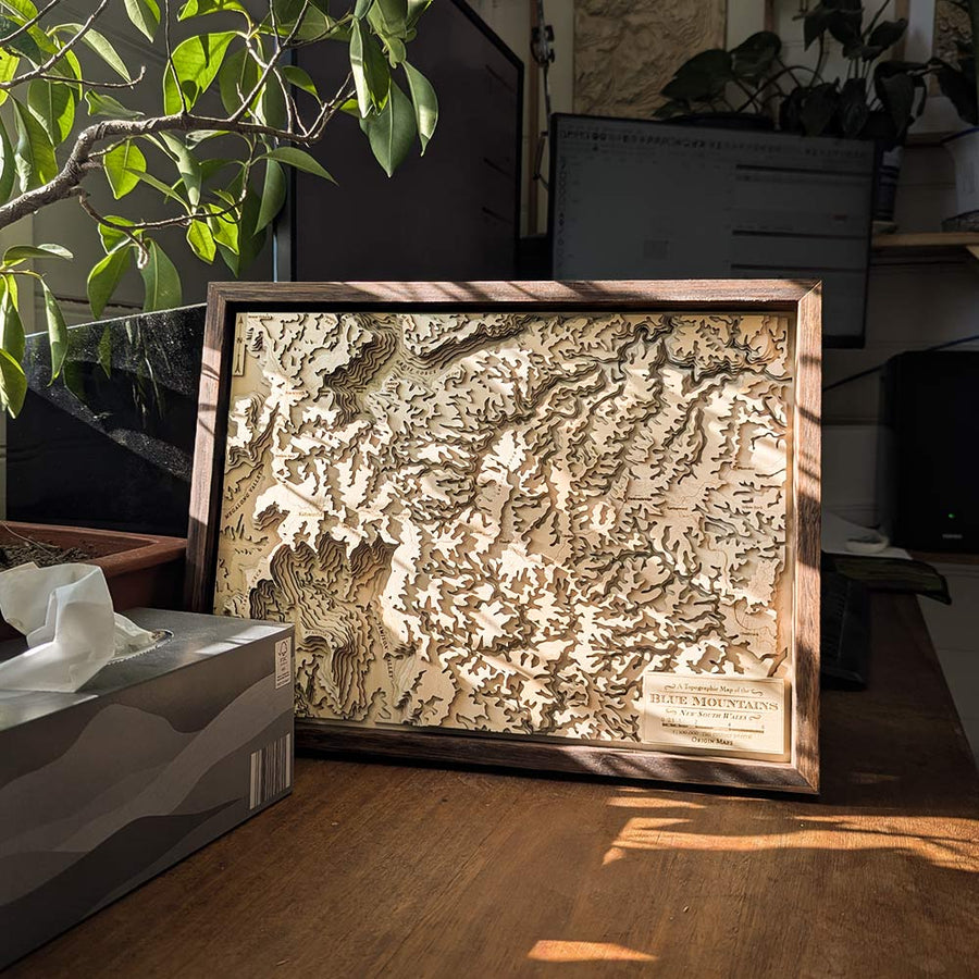 Blue Mountains Framed Wooden Map on a table