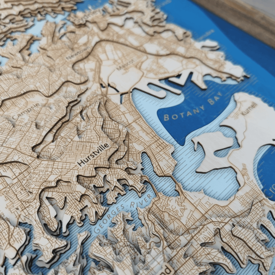 Hurstville and botany bay as seen on a wooden 3d topographic contour map art