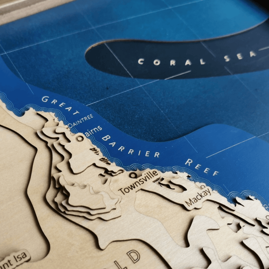Great barrier reef map art townsville coral sea all featured on a wooden map