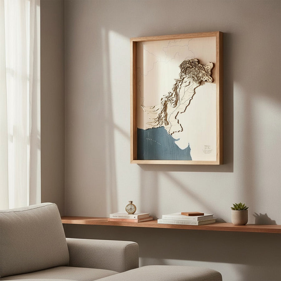 Wooden Map of Islamabad and Pakistan in a wooden frame on a living room wall