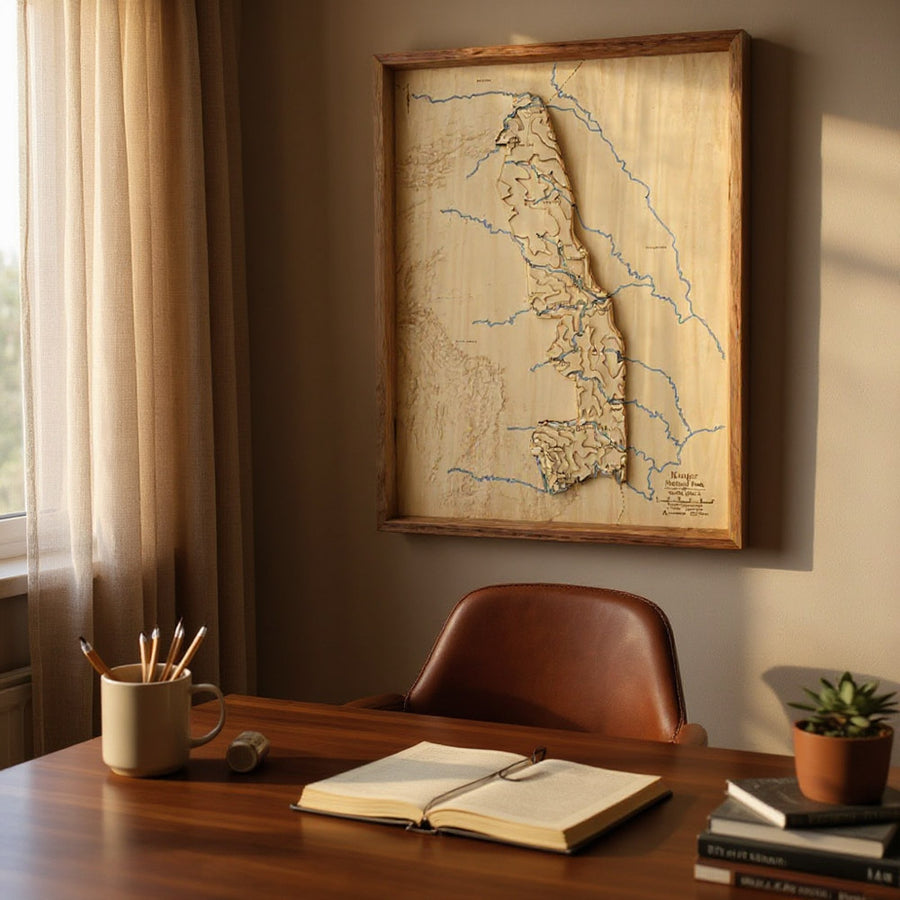 Framed wooden map of Kruger national park in an office with warm lighting