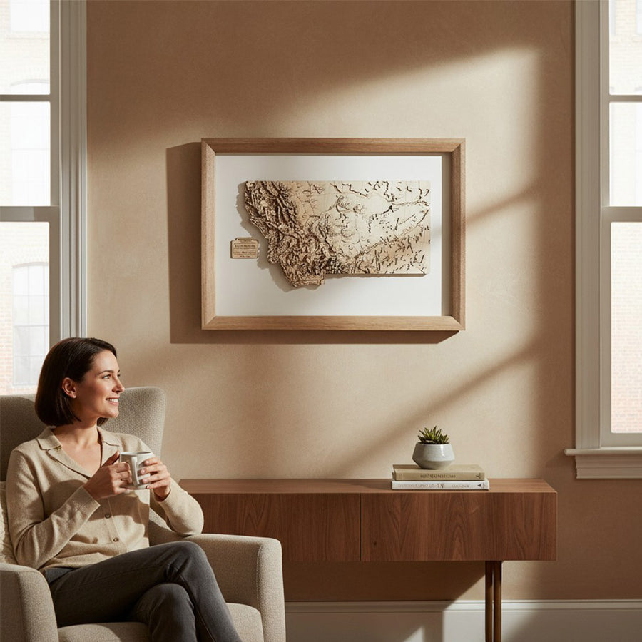 Framed map of Montana, USA with a content woman in front of it