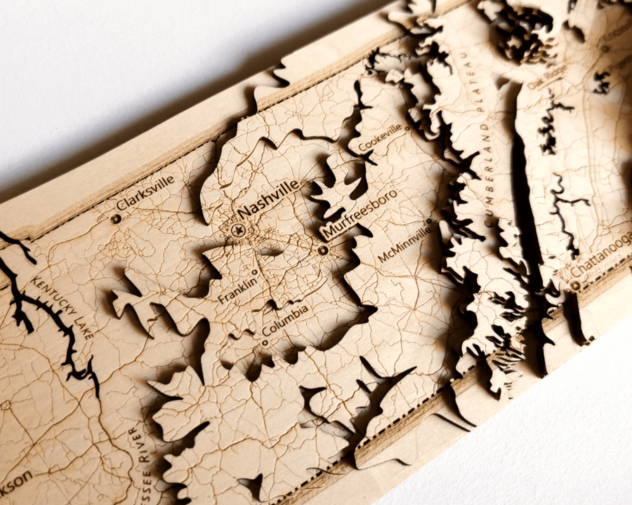 Wooden 3d map of Tennessee state highlighting nashville and clarksville and the surrounding hills and mountains