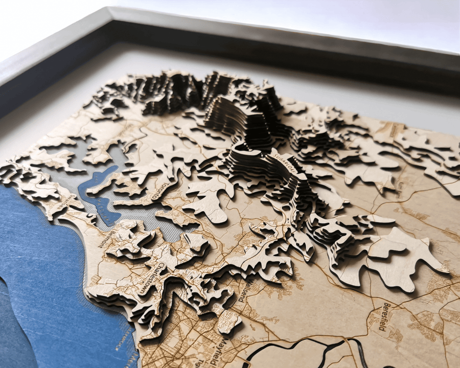 Sugarloaf of newcastle in a wooden contour map