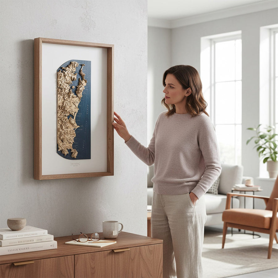 Woman touching a framed map of Sydney australia
