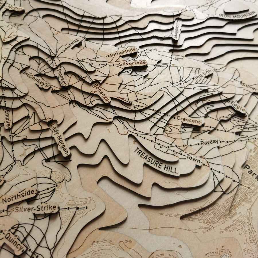 Wooden contour map of a ski resort that is park city in utah usa. Up close is treasure hill and the bonanza ski lift