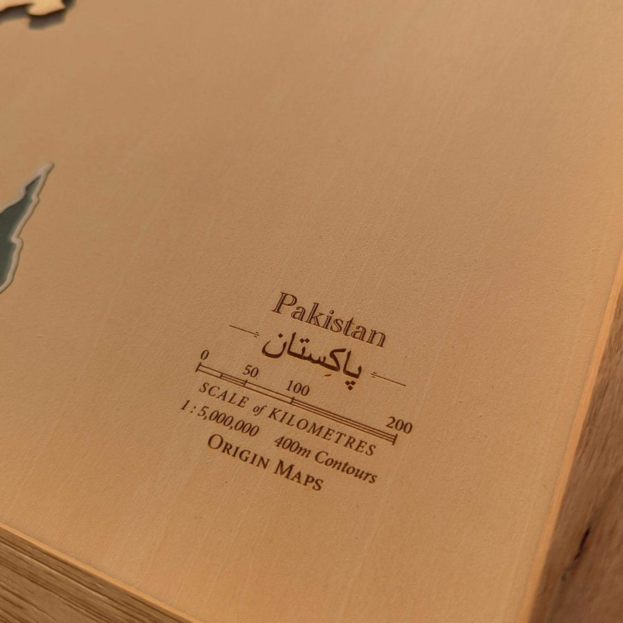 Map of Pakistan with scale and measurement details on a brown background