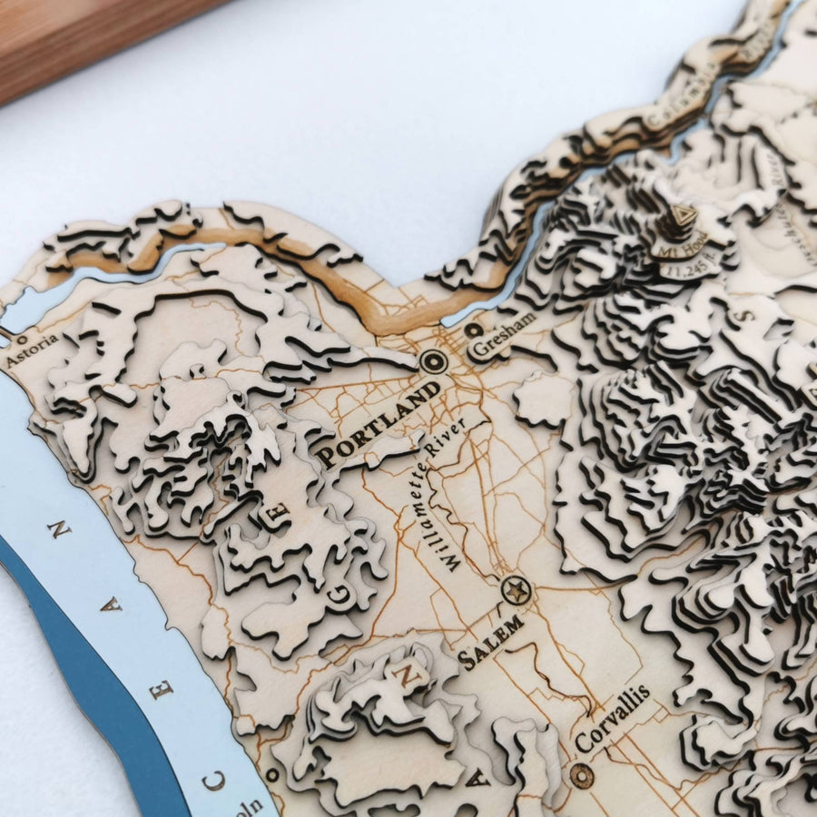 close up of Portland Oregon on a wooden contour map