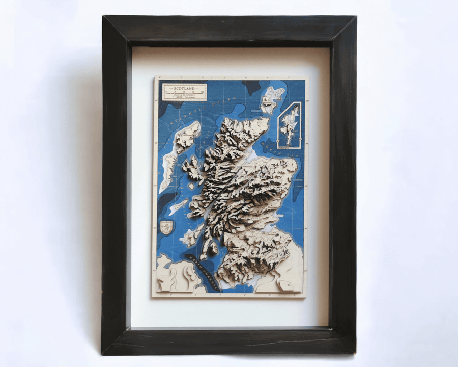 Small size wooden contour map art of scotland in a black frame ready to be hung on the wall or given as a gift