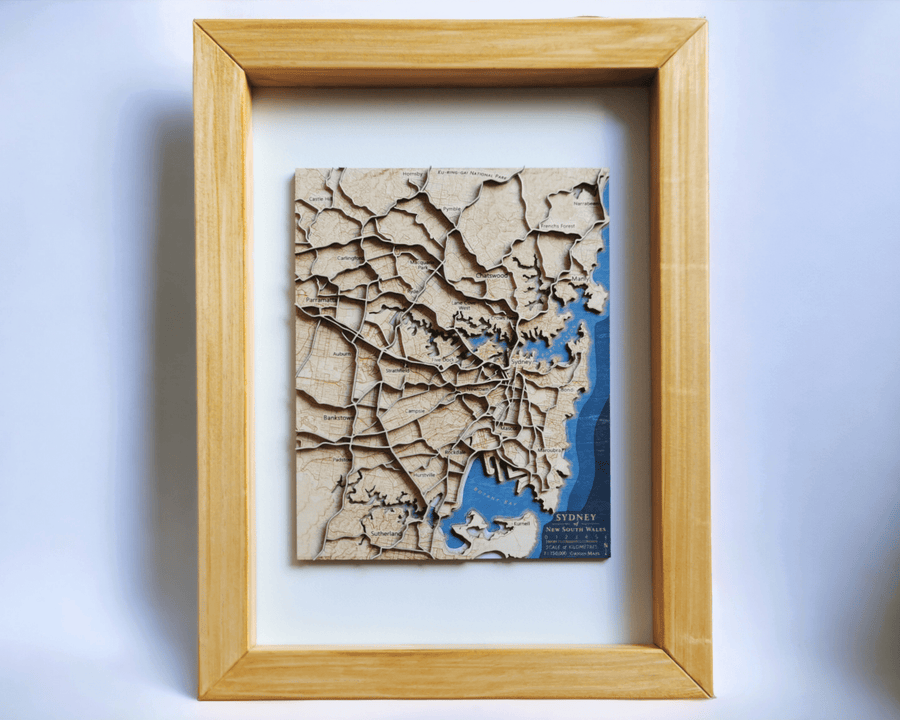 Sydney relief map made of wood in a maple frame