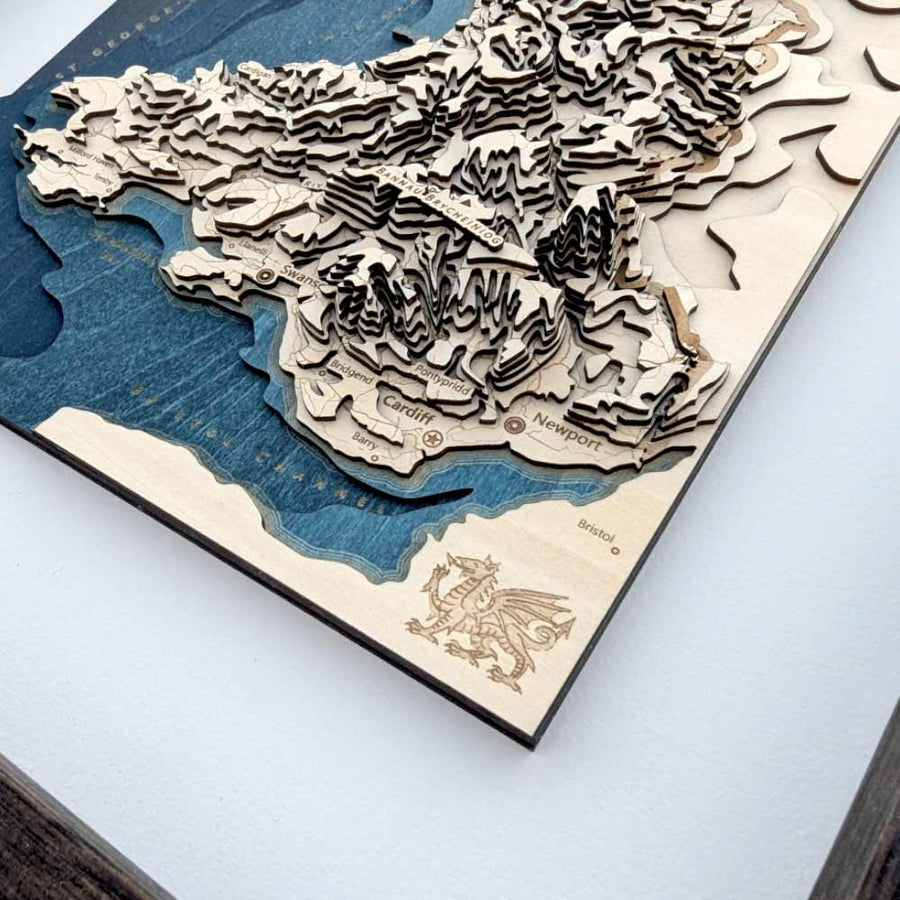 Laser cut wooden map of wales with a Welsh dragon