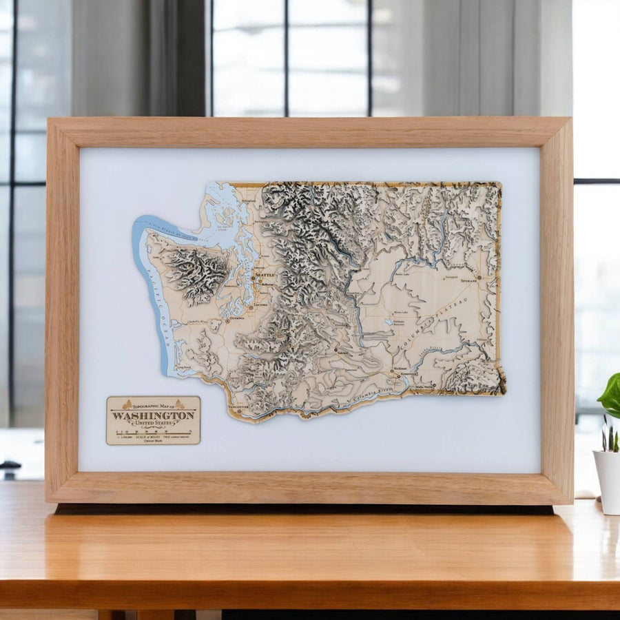 map art of washinton state sitting a top a minimalist modern desk