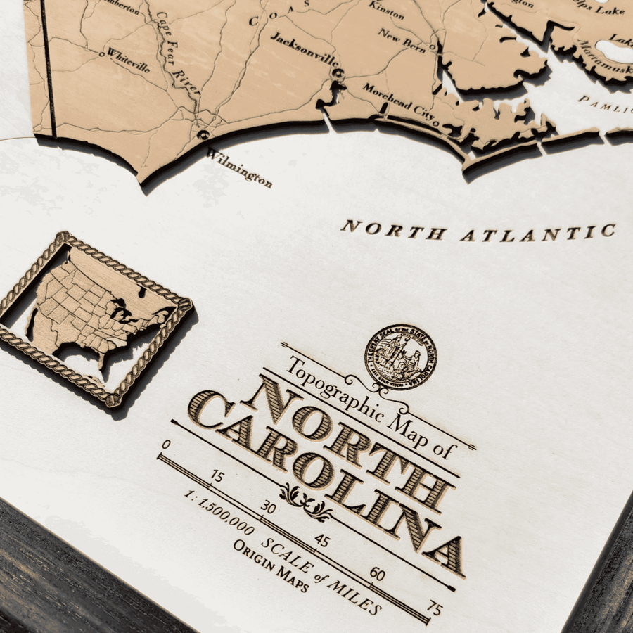 North carolina map legend featuring the seal of the state and a mini map of the usa