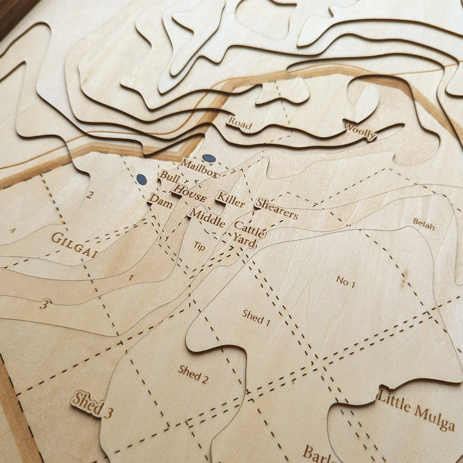 Close up of a contour map of a farm showing fence lines and dams