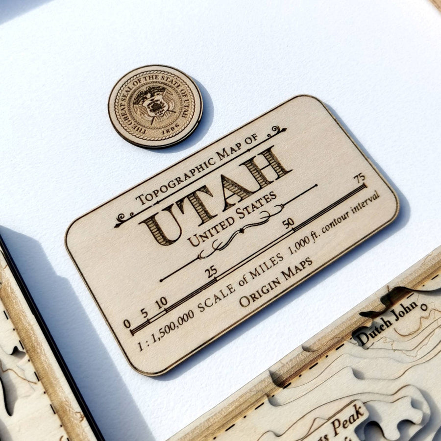 Close up of a map legend of the state of Utah featuring the state seal