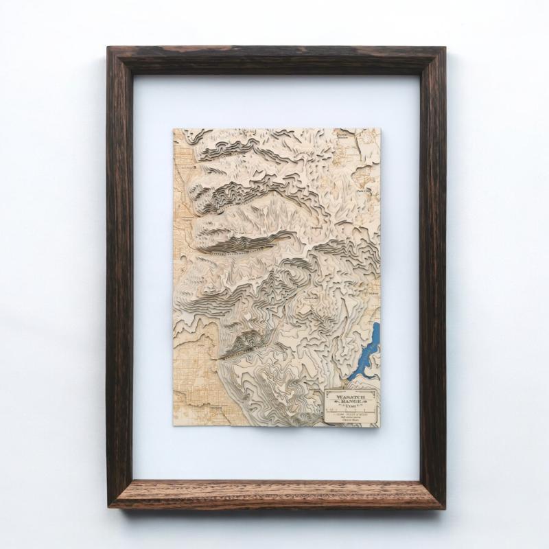 Framed topographic carved map art of wasatch range of utah with a plain white backgroud